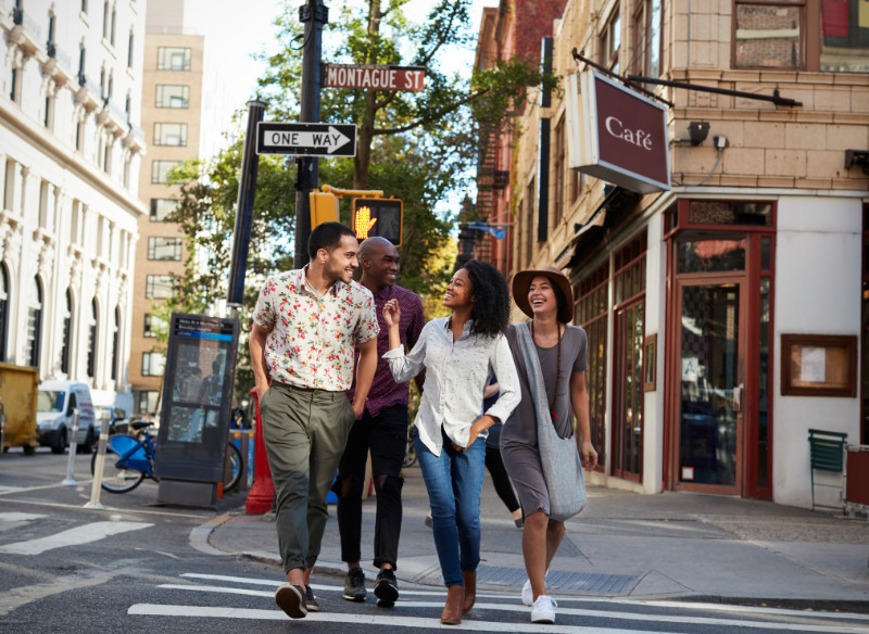 Group of friends crossing the street